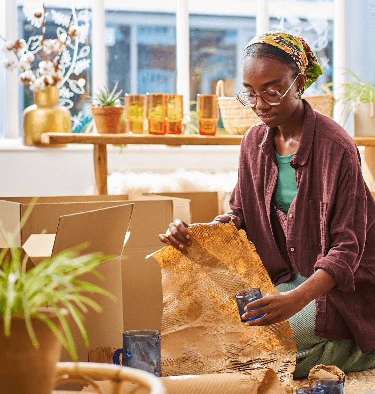 women packaging glass