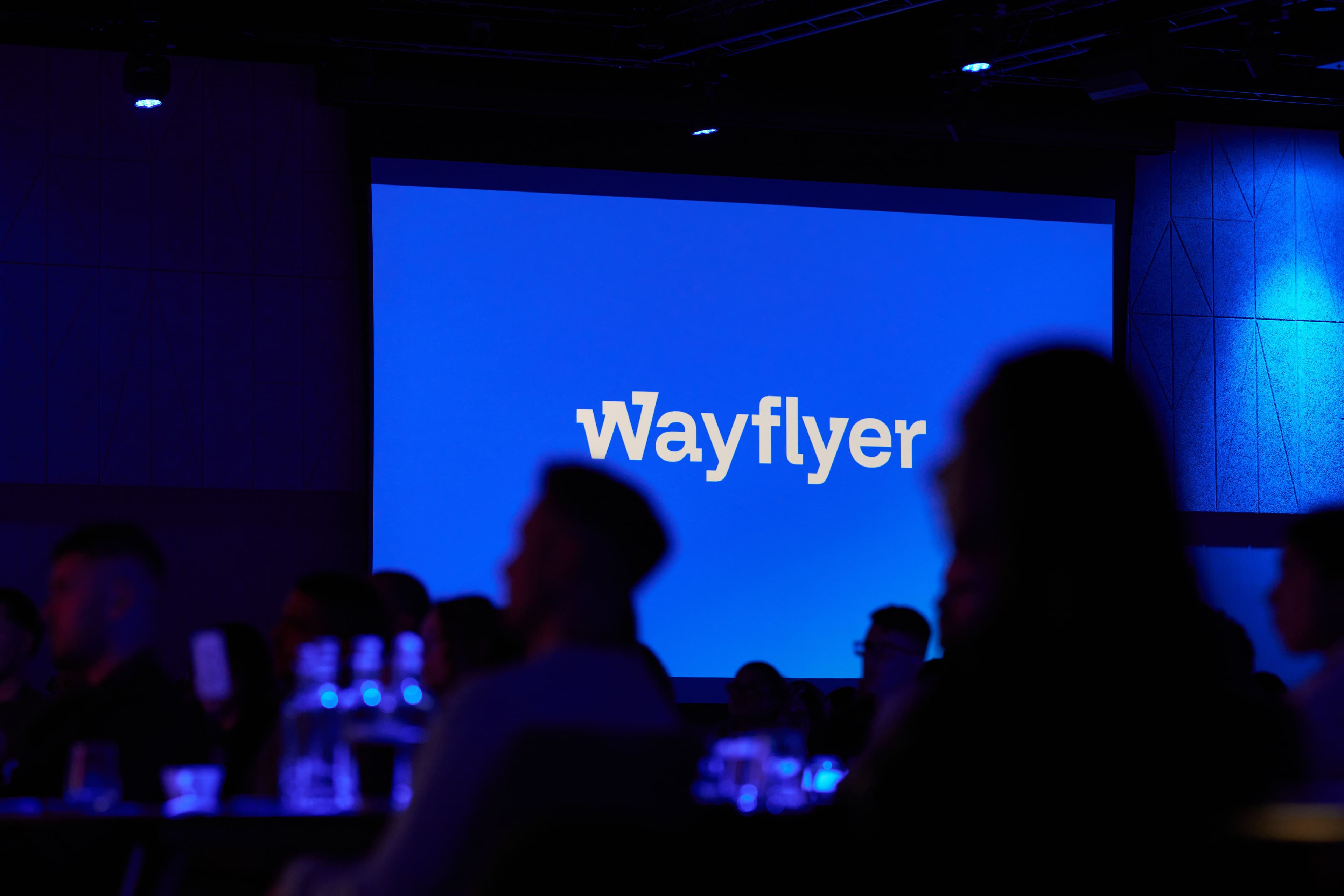 Wayflyer logo at conference